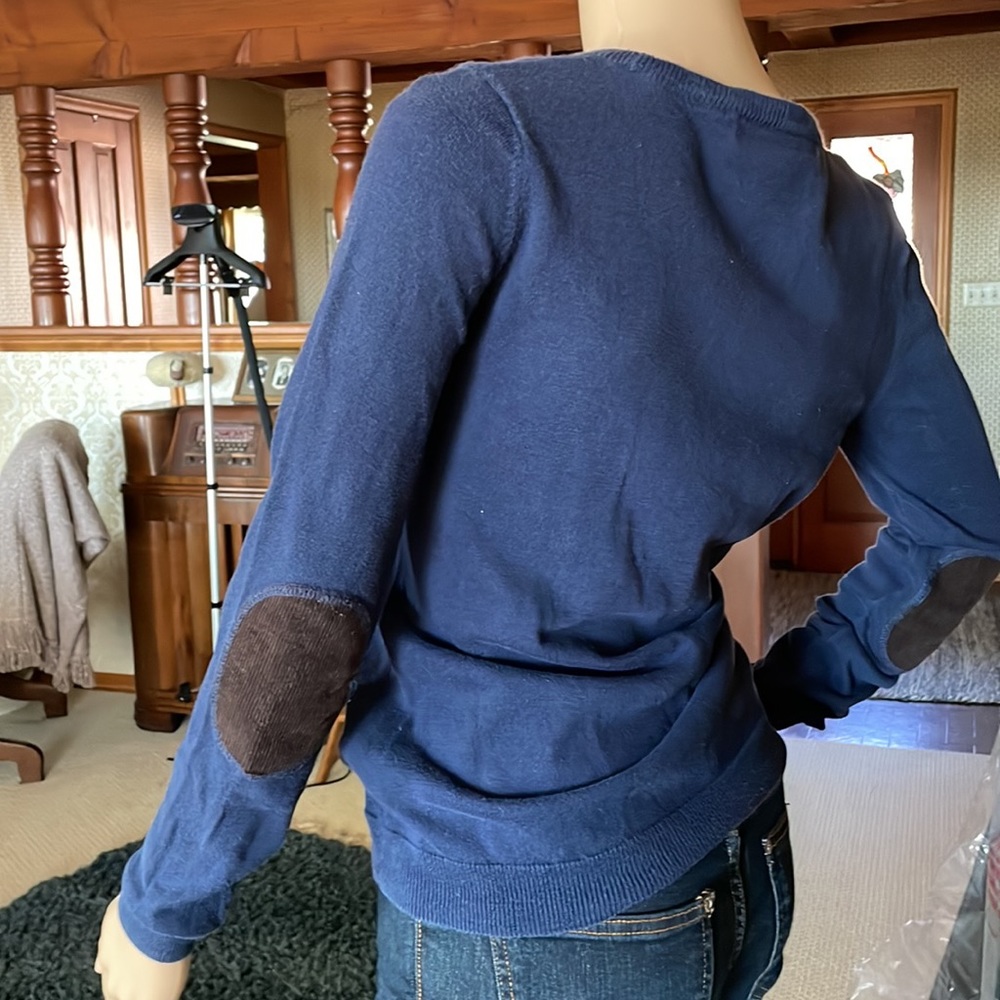 Navy sweater with brown elbow patches